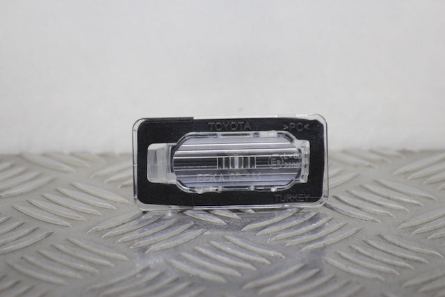 Toyota Corolla Number Plate Light Drivers Side (2024) - Part photo