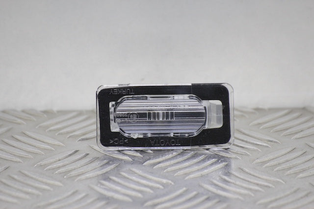 Toyota Corolla Number Plate Light Passengers Side (2024) - Part photo