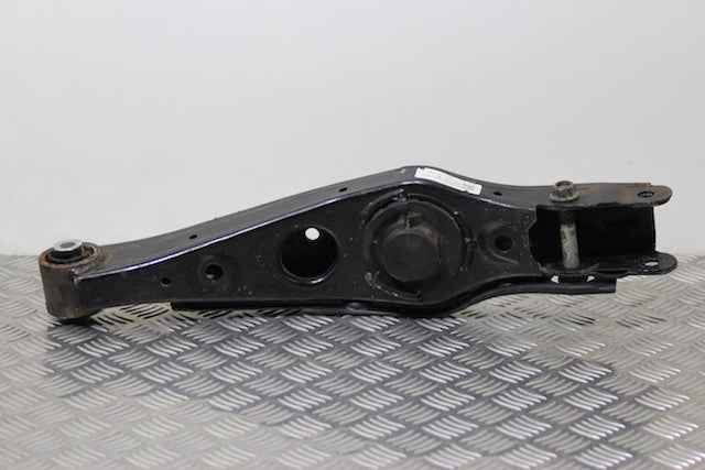 Kia Sportage Control Arm Spring Support Rear Passengers Side 